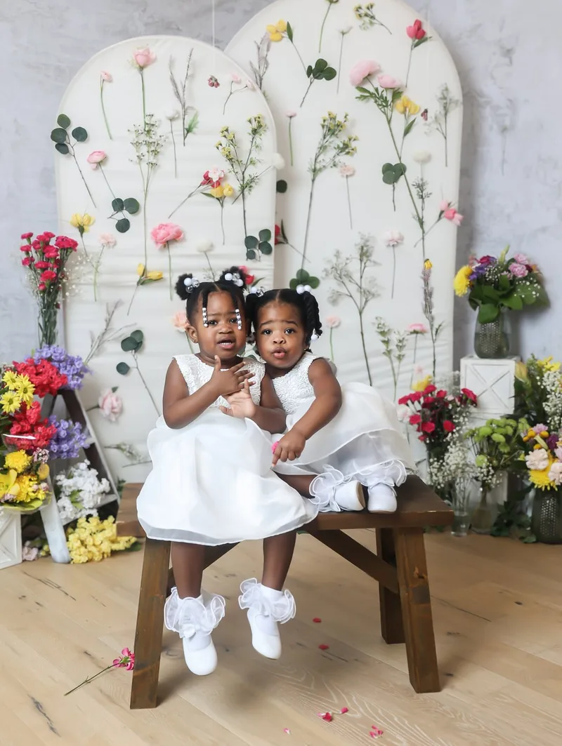 Malaiya and Miyanna dressed up and smiling for the camera
